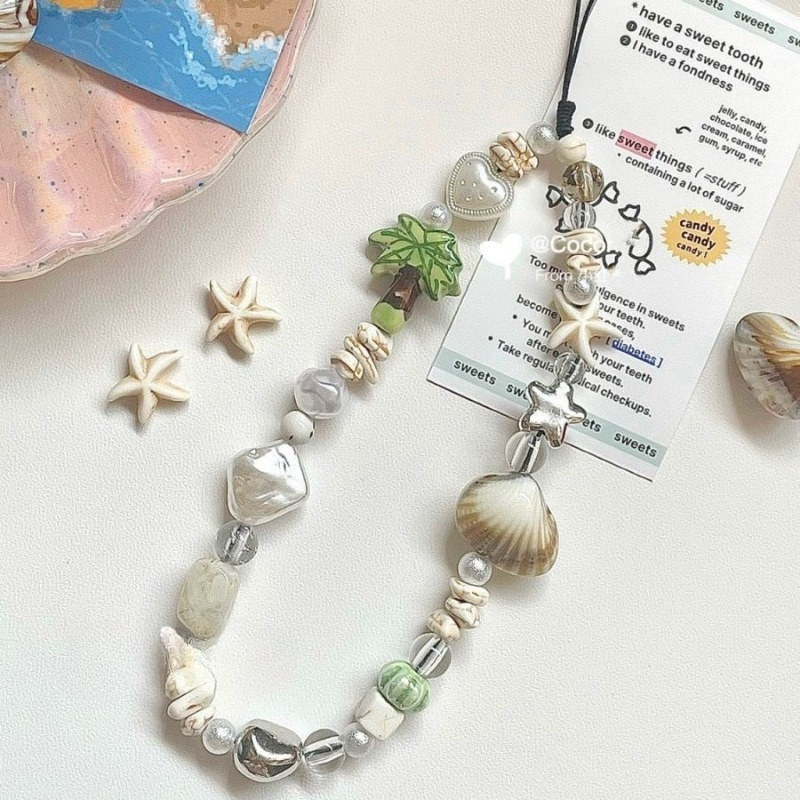 Yazlık Deniz Kabuğu Boncuklu T - Camera Wrist Strap incelemesi ve fiyatı